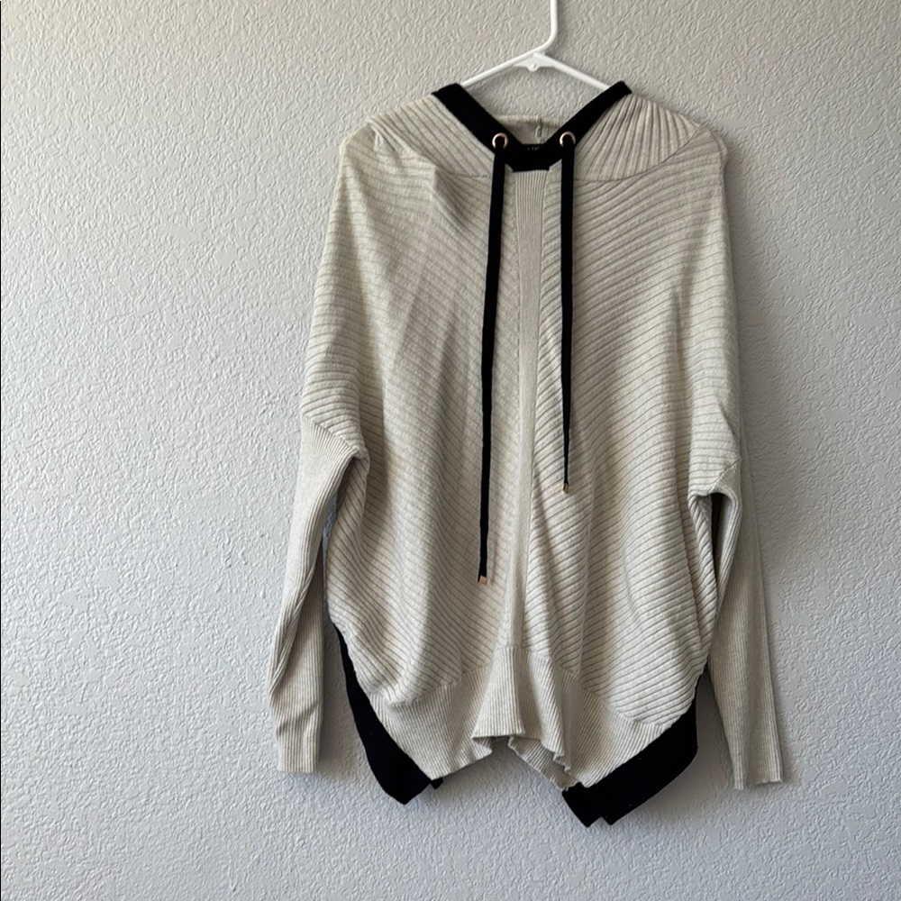 Stylish Cream Sweater with Black Accents